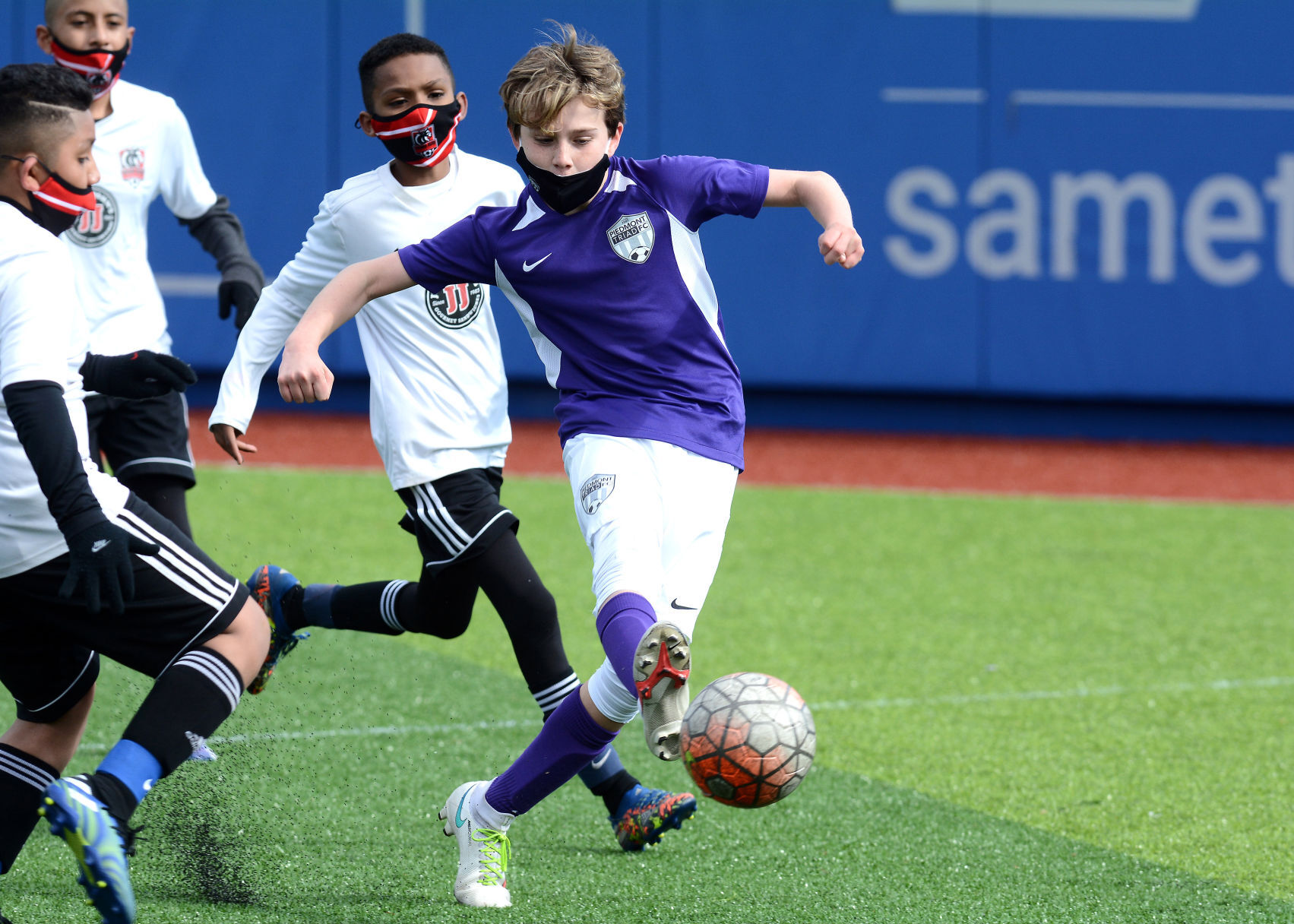 Youth compete in soccer tournament